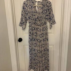 Floral jumpsuit with waist tie